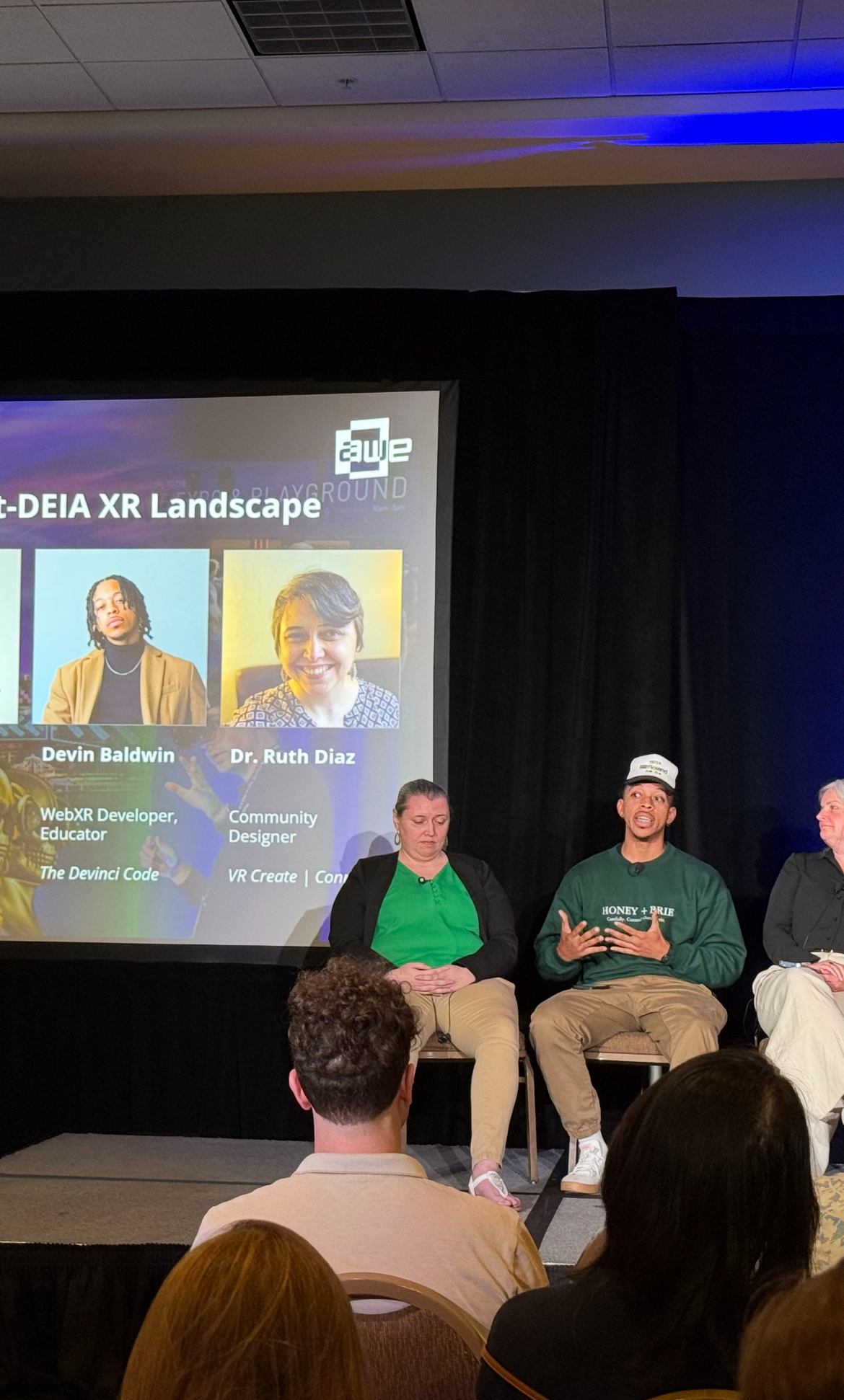 Devin speaking at AWE 2025