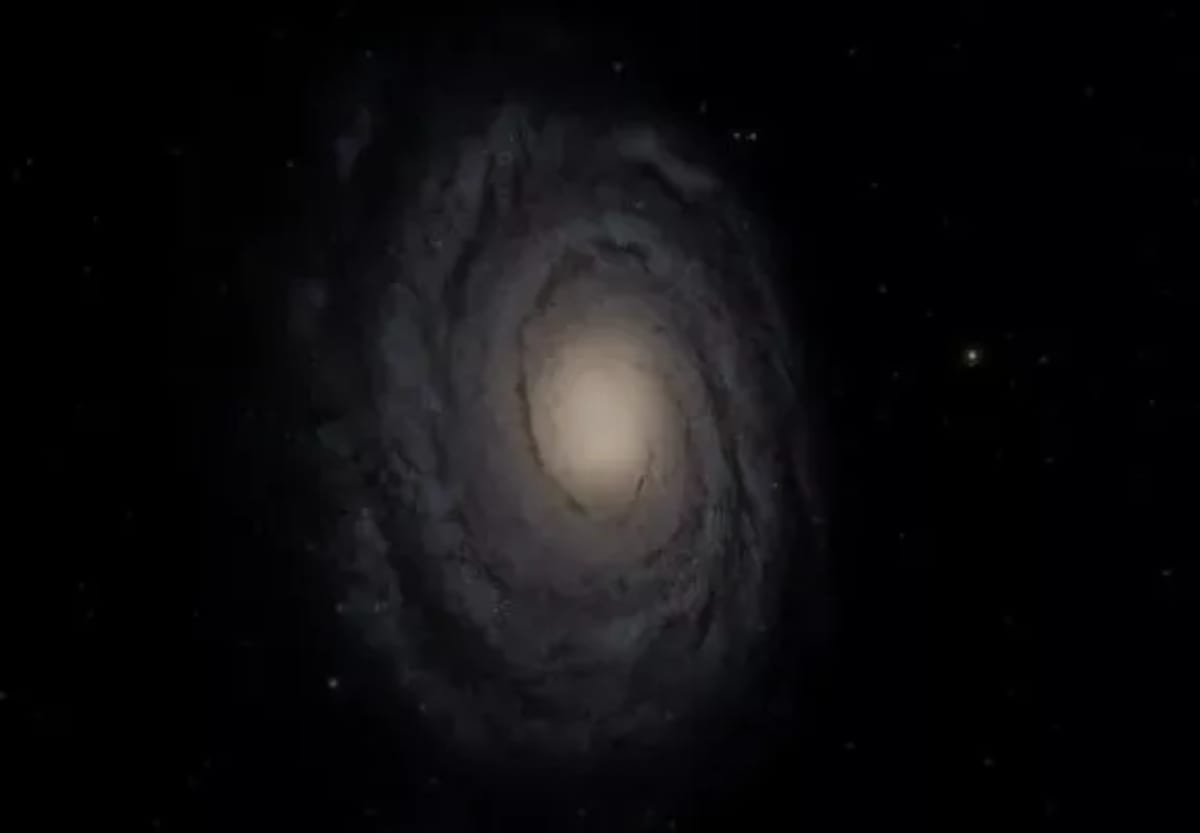 Galaxia de Andrómeda, con su forma espiral y un núcleo brillante en el centro