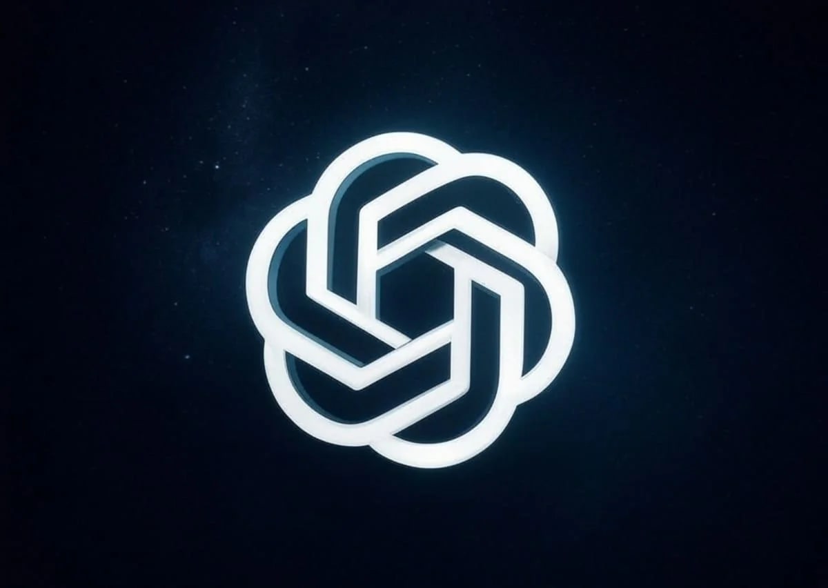 Logotipo iluminado de OpenAI sobre un fondo oscuro con un estilo minimalista y futurista.