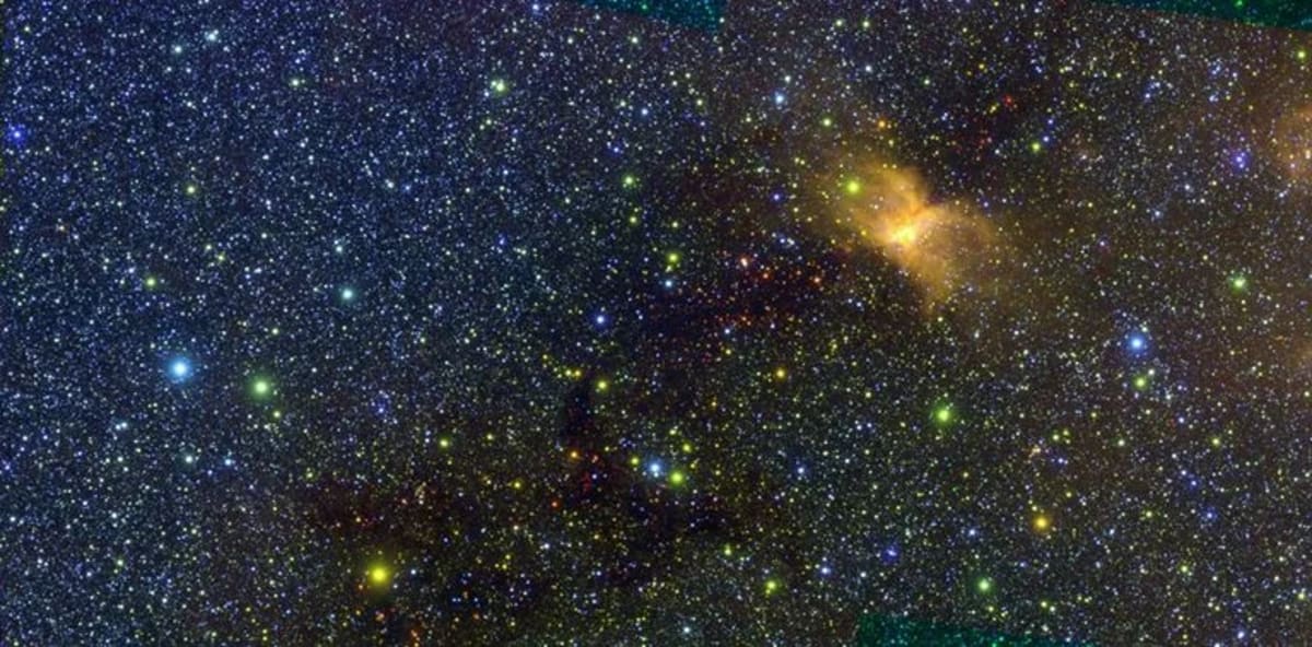 Imagen infrarroja de la cresta molecular de Vela captada por la misión SPHEREx de la NASA