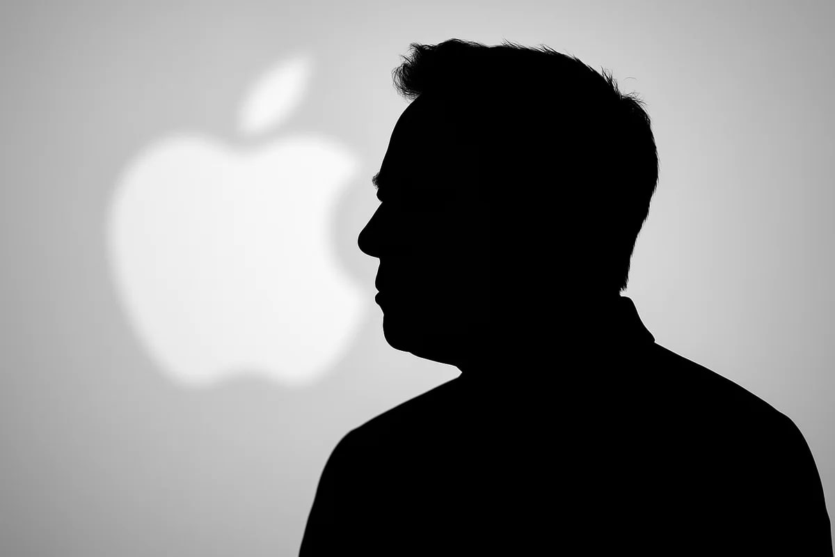 Silueta negra de Elon Musk con el logo de Apple desenfocado en el fondo
