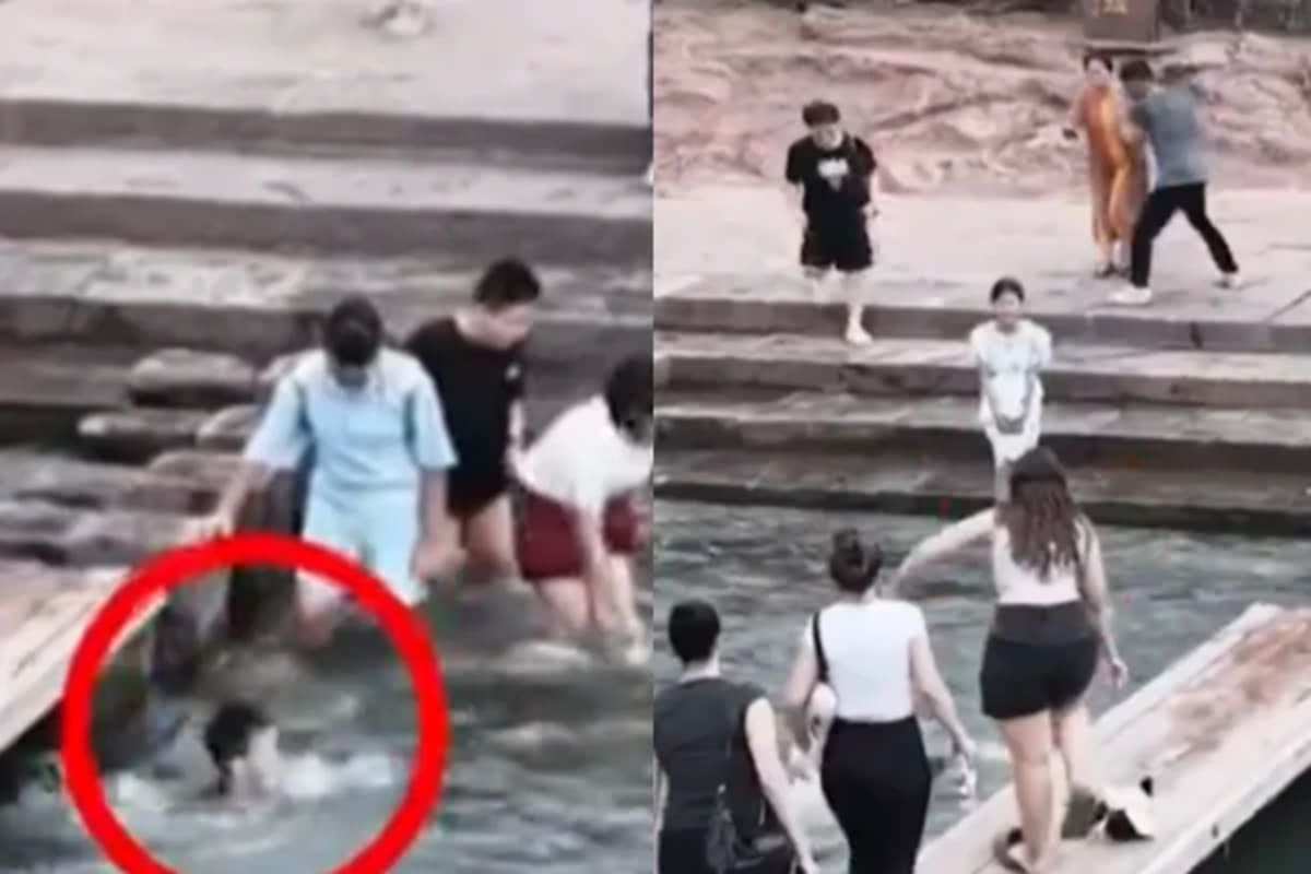 Marta Santana rescatando a un niño de ahogarse en el río Tuojiang, en Fenghuang, China