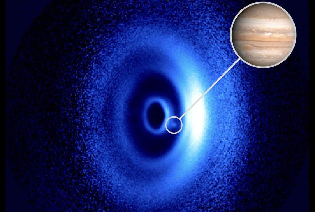 Planeta recién nacido en un disco de polvo alrededor de una estrella joven