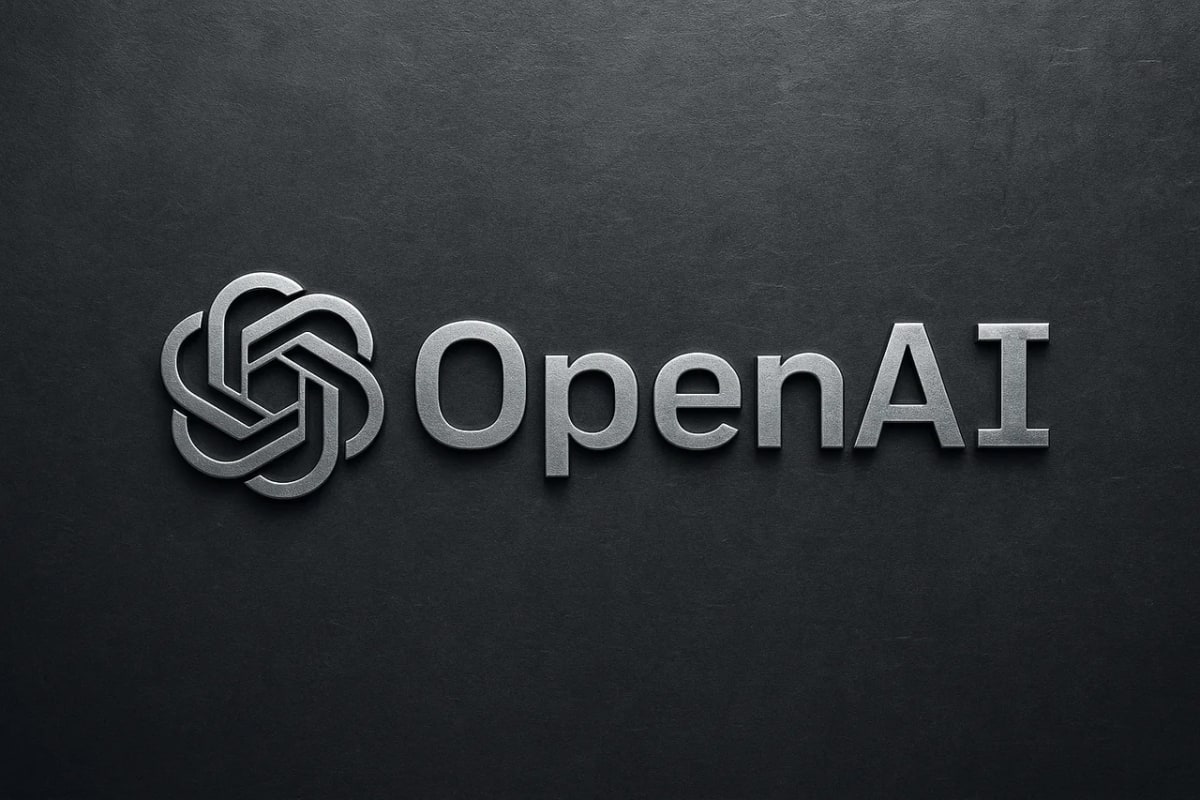 Texto metálico “OpenAI” sobre fondo oscuro con textura