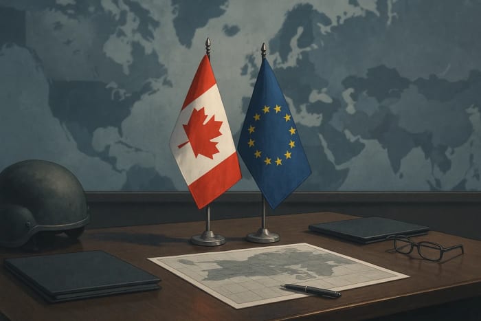 Banderas de Canadá y la Unión Europea sobre una mesa de reuniones