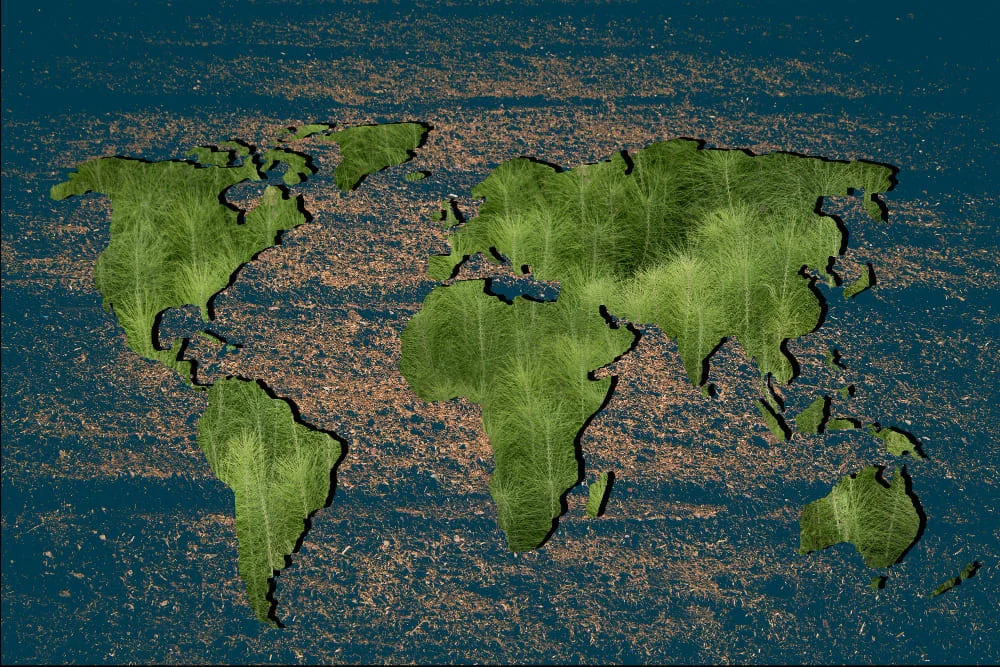 Mapa estilizado que representa una Tierra plana con textura de césped sobre fondo oceánico para ilustrar la concepción antigua del mundo