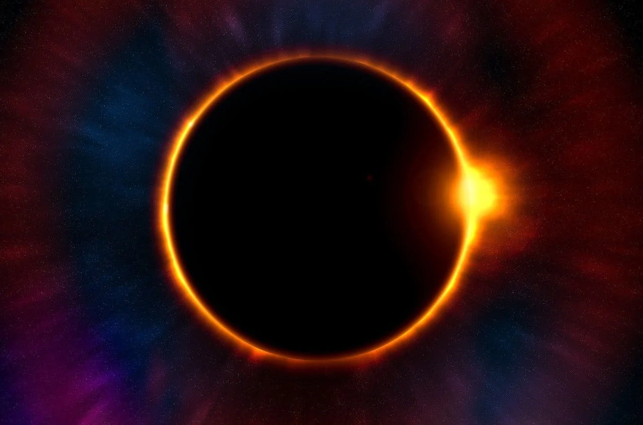 Representación artística de un eclipse solar con la Luna cubriendo parcialmente al Sol brillante.
