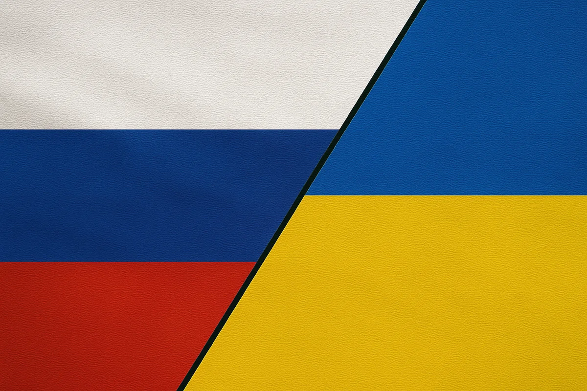 Banderas de Rusia y Ucrania separadas por una línea negra diagonal fina
