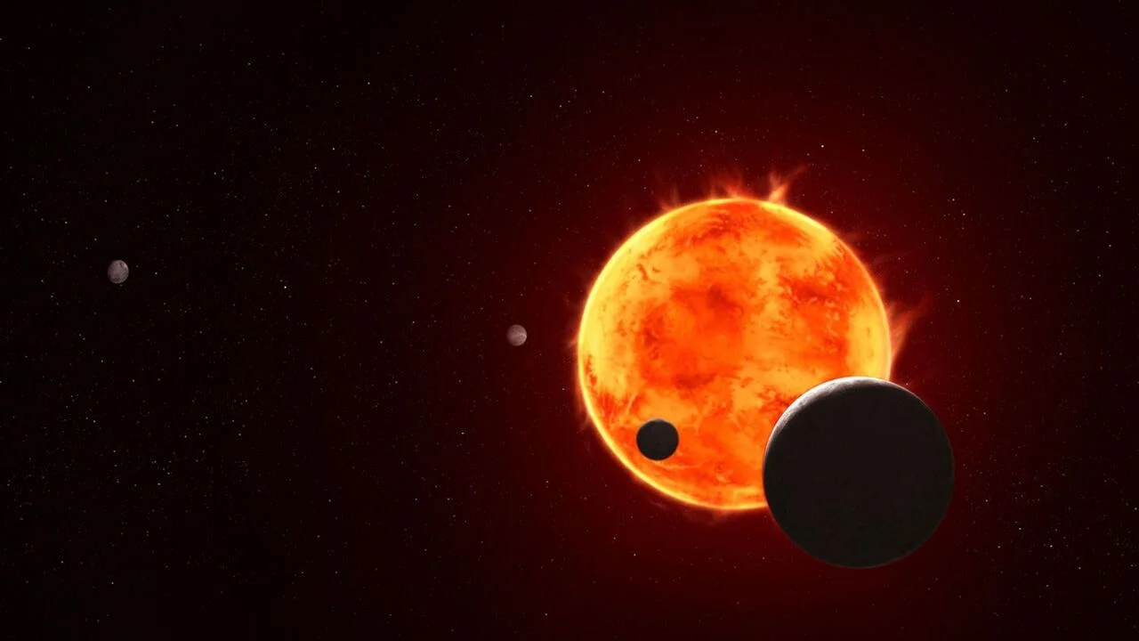 Ilustración artística de la estrella enana roja TRAPPIST-1 y varios de sus planetas observados por el Telescopio Espacial James Webb