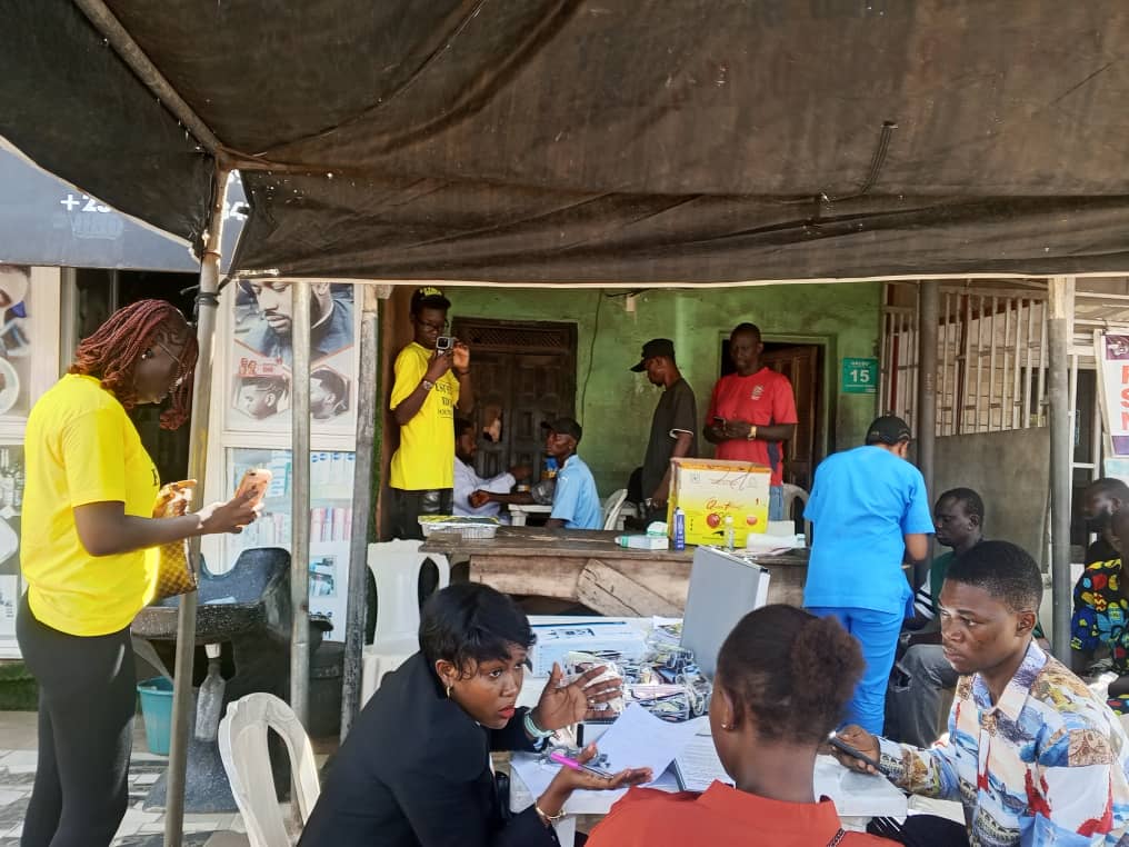 Community members receiving support during the foundation outreach
