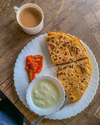 Alu Paratha (Dahi, Achar with milk tea)