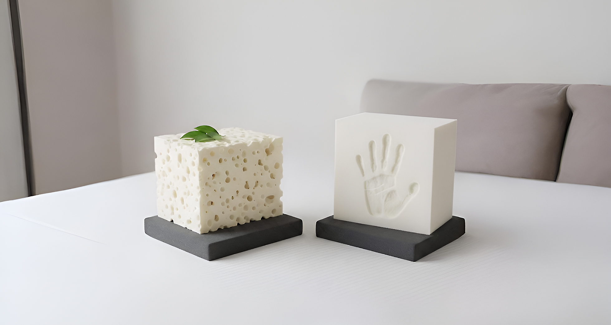 Latex cube on the left and memory foam cube on the right.