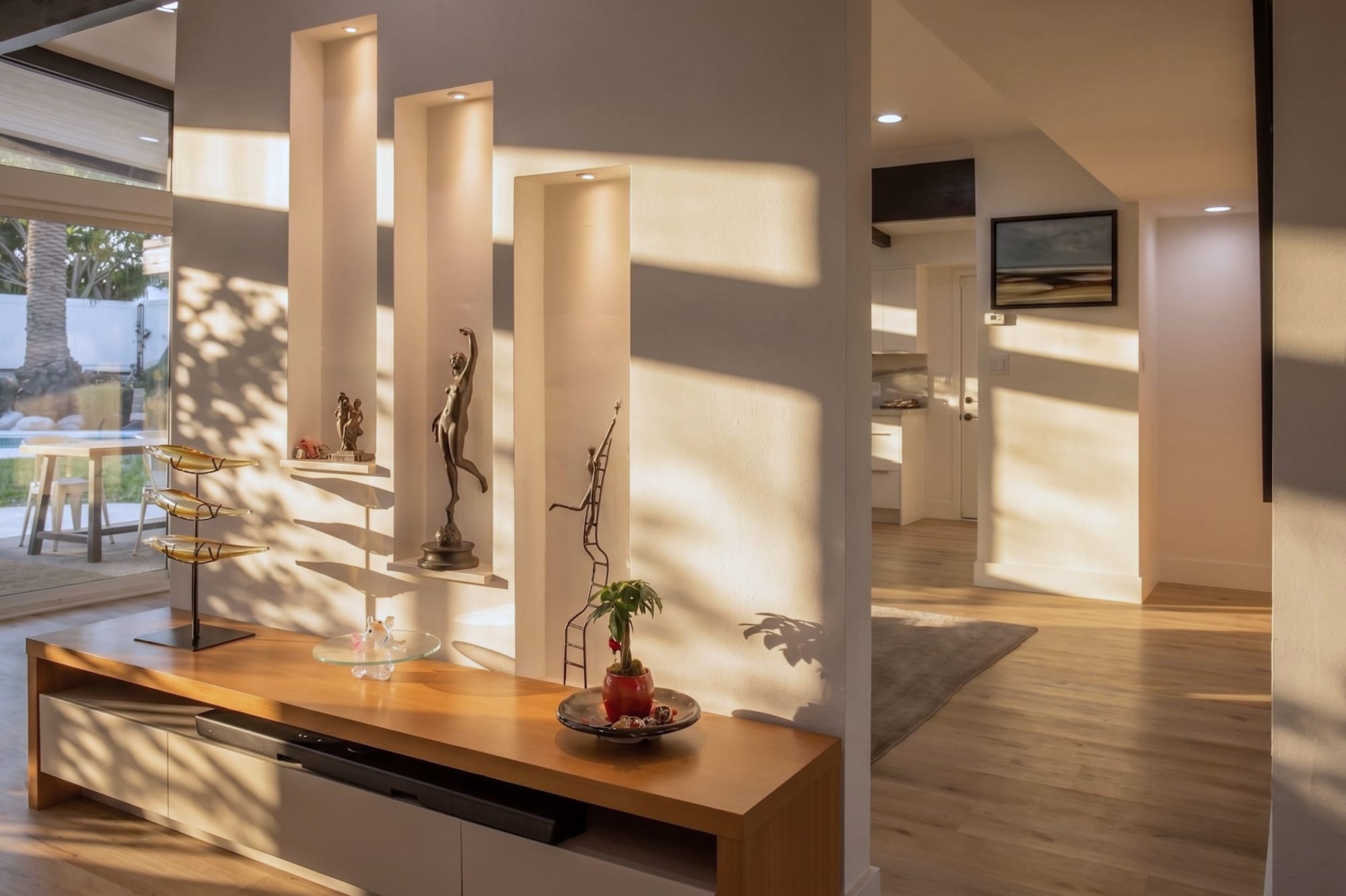 The dining area, open and generous, framed by post-and-beam construction.