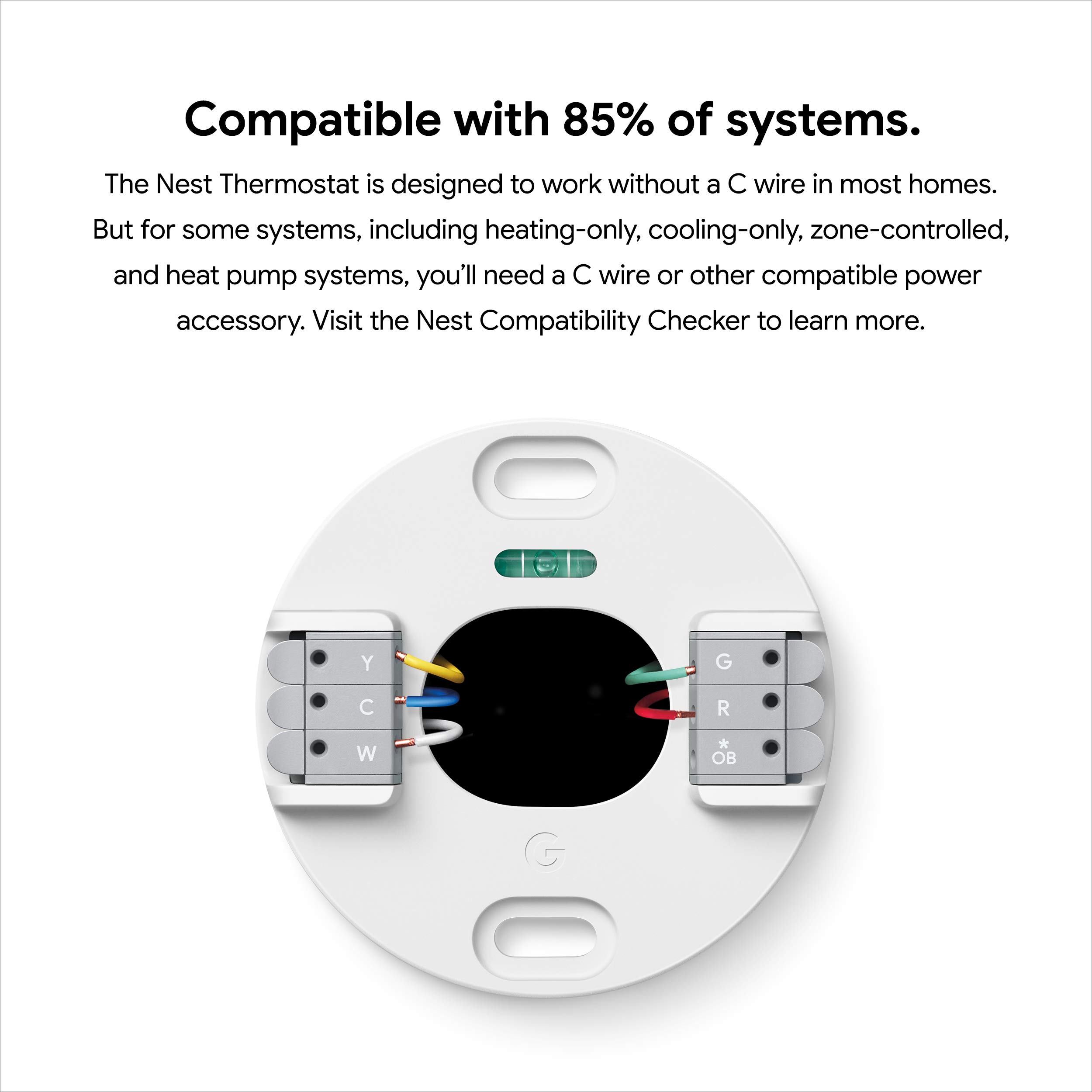The Google Nest Thermostat in Snow, showcasing its round, glossy display which users report can be prone to significant glare and reflections.