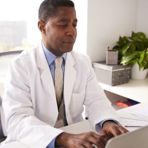 Doctor working on the computer