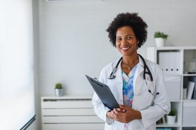 Doctor holding clipboard