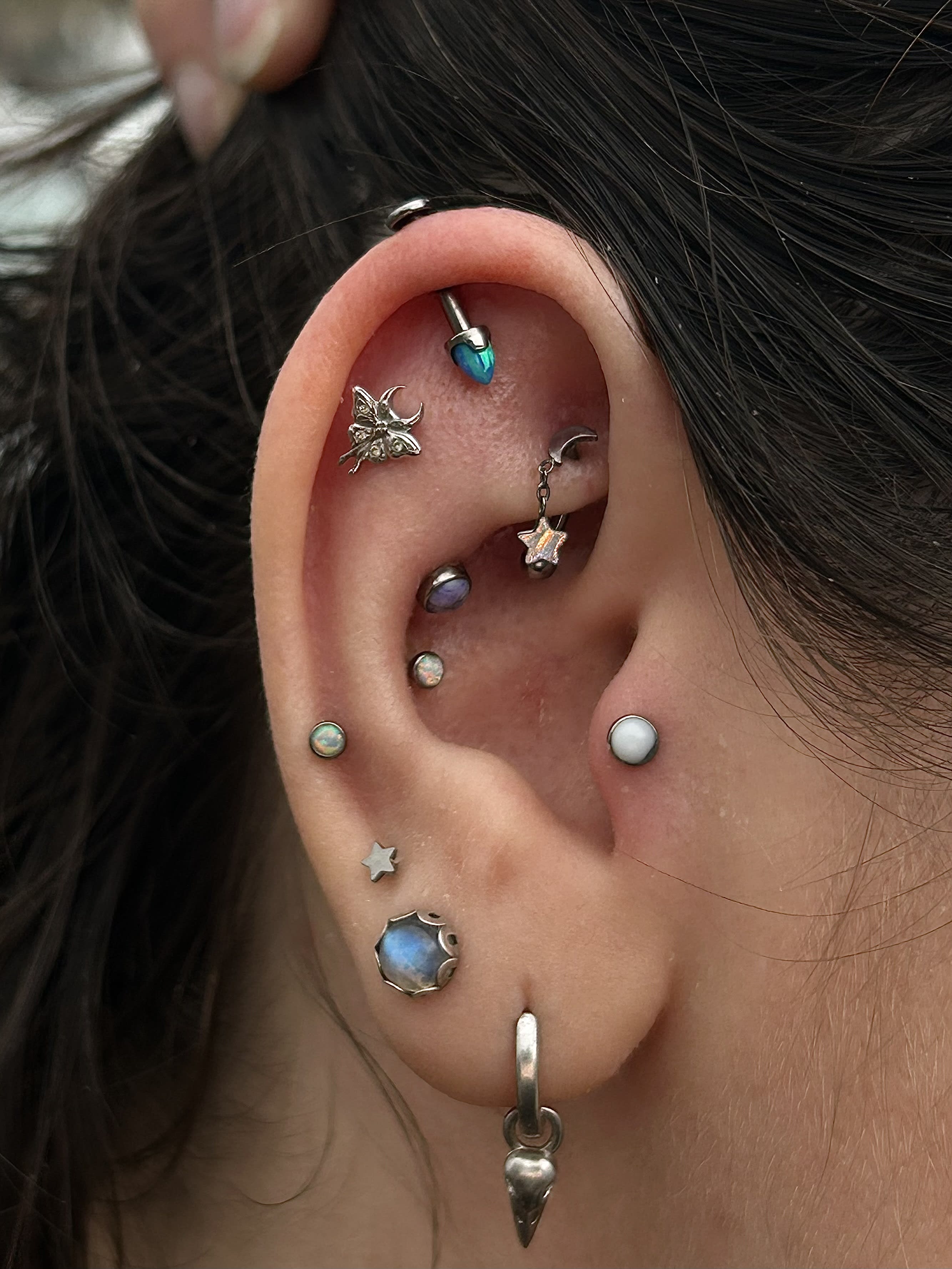 Fresh opal spike and some healed piercings on an ear//lovely client that has been a pincushion for me over the years. I am so grateful for the clients that have allowed me to grow with them as a piercer. They are a huge contribution to why I am able to own my own private studio today and have the skill set to do so while continuing on my life long learning journey. 