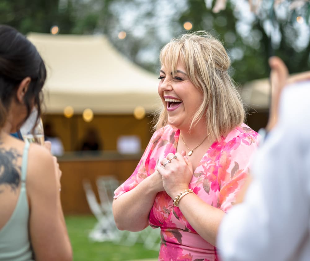Guest laughing at the reception