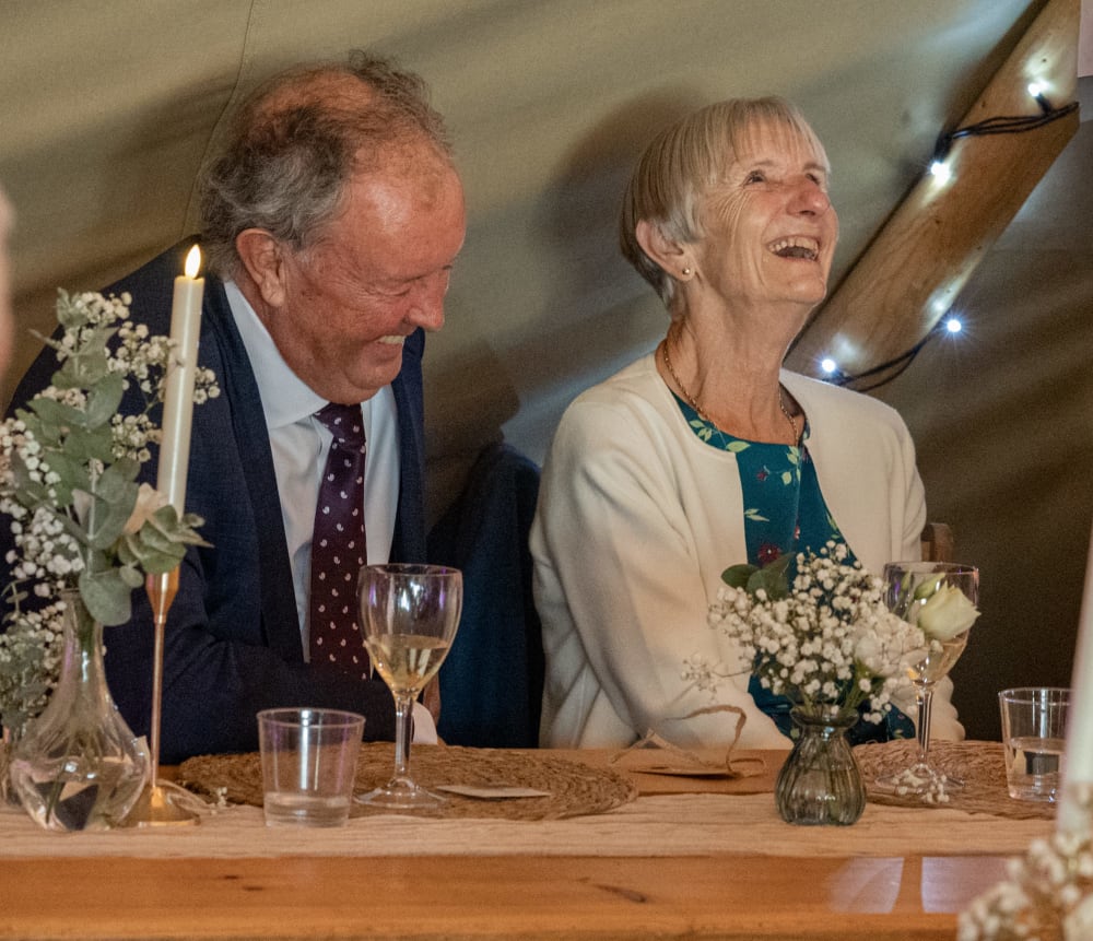 Guests laughing during the speeches