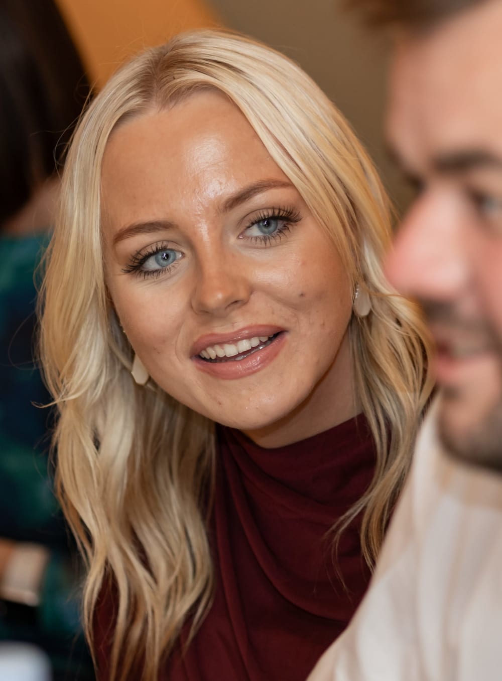 Wedding guest smiling