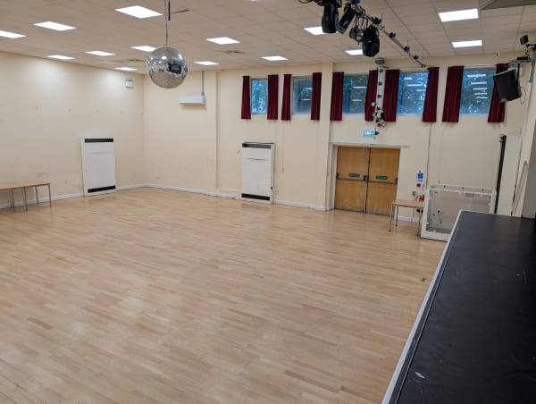 Hall from stage left showing disco ball and decorations