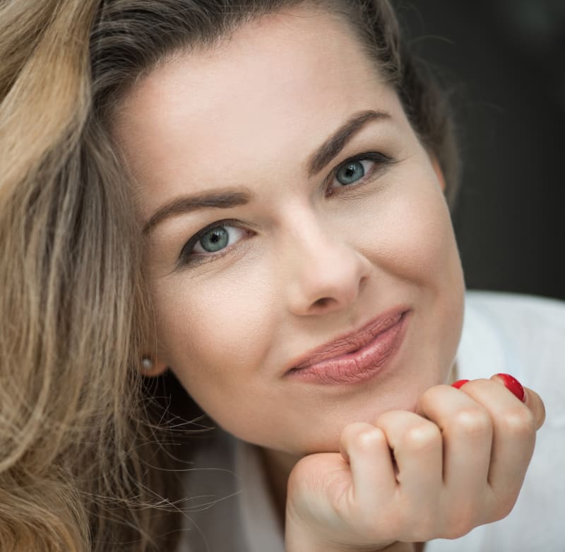 Woman smiling after laser treatment