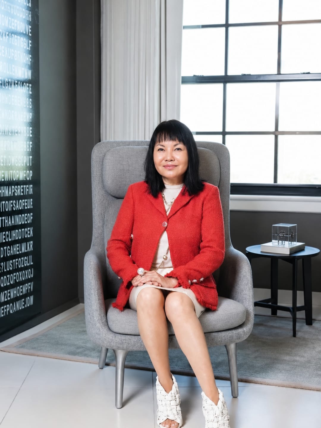 Facial Plastic Surgeon Washington, DC: Woman seated in modern clinic consultation room