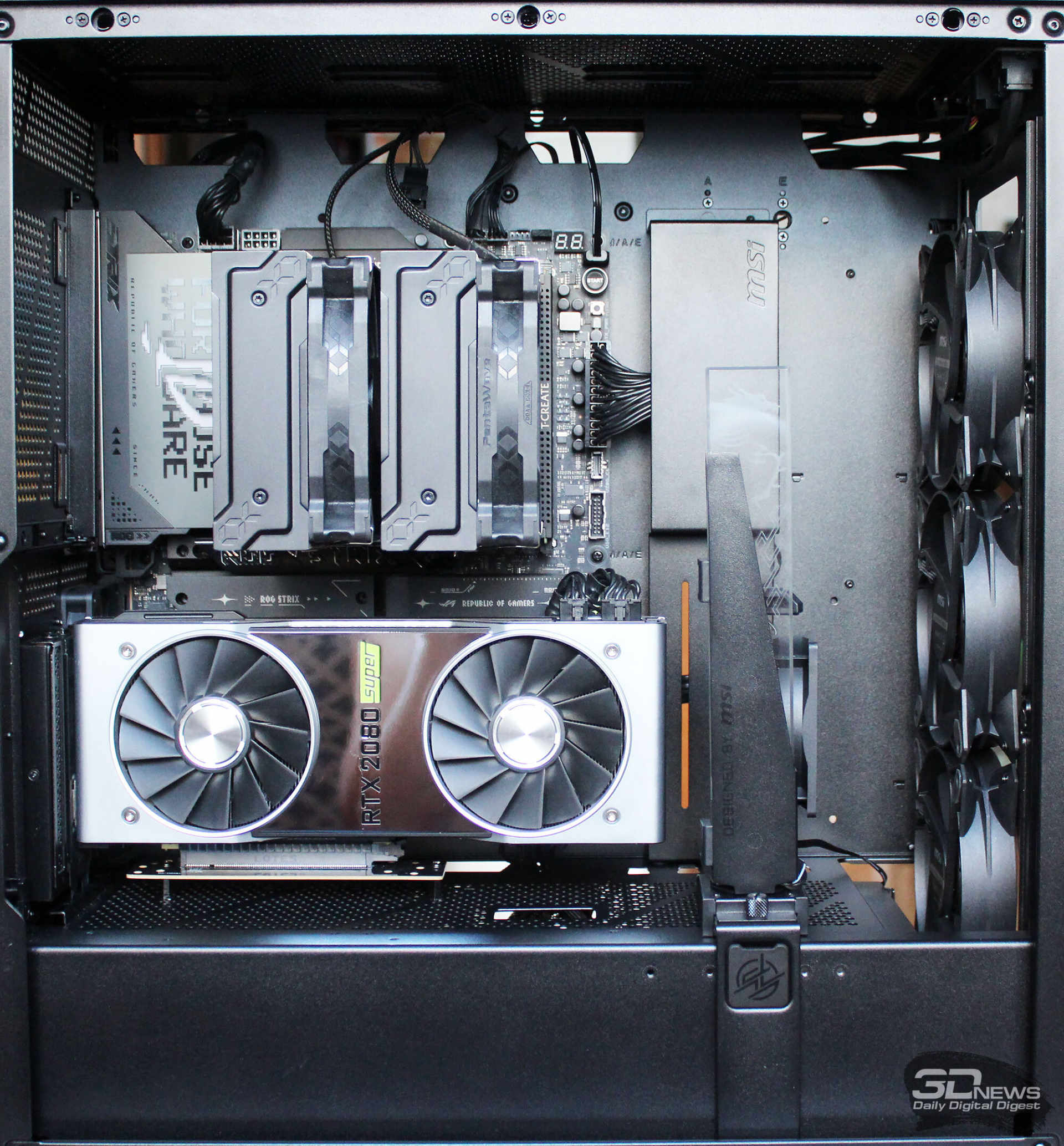 Inside of a compact PC case with an Nvidia RTX 2080 Super graphics card mounted below the motherboard and a vertical GPU support bracket beside it