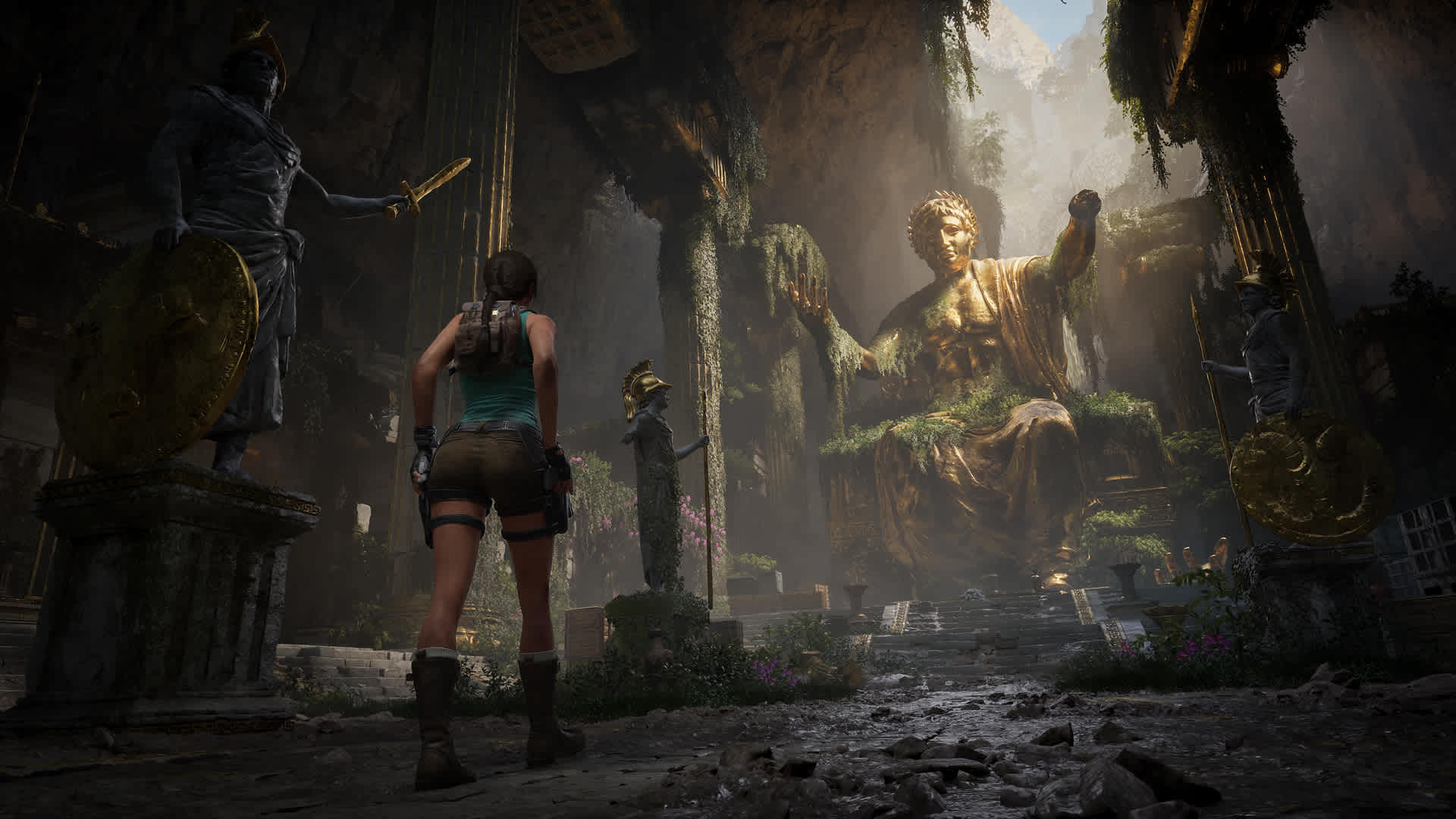 Lara Croft exploring an ancient tomb interior in Tomb Raider Legacy of Atlantis