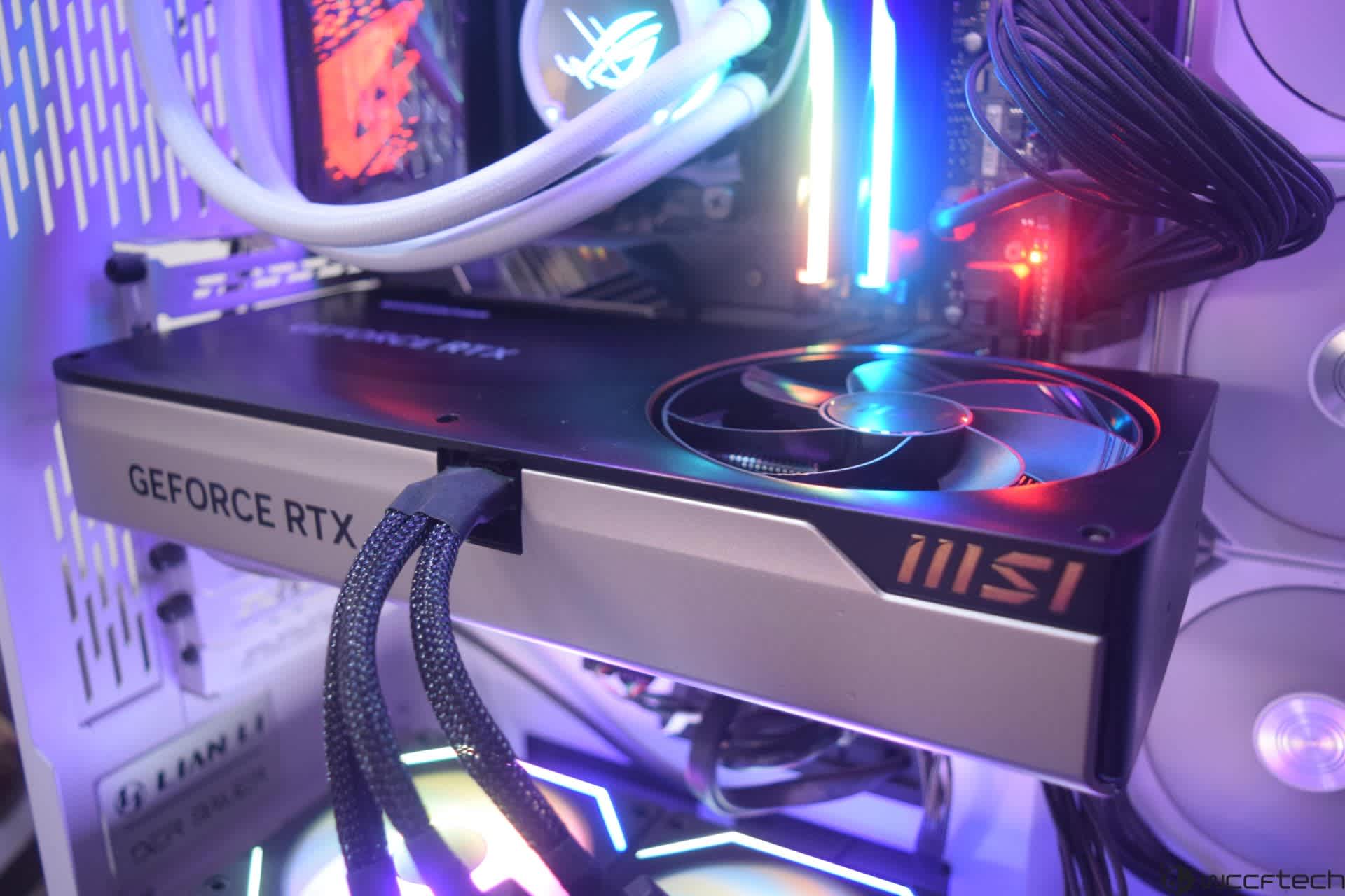 Modern graphics card installed in a gaming PC case with the side panel removed