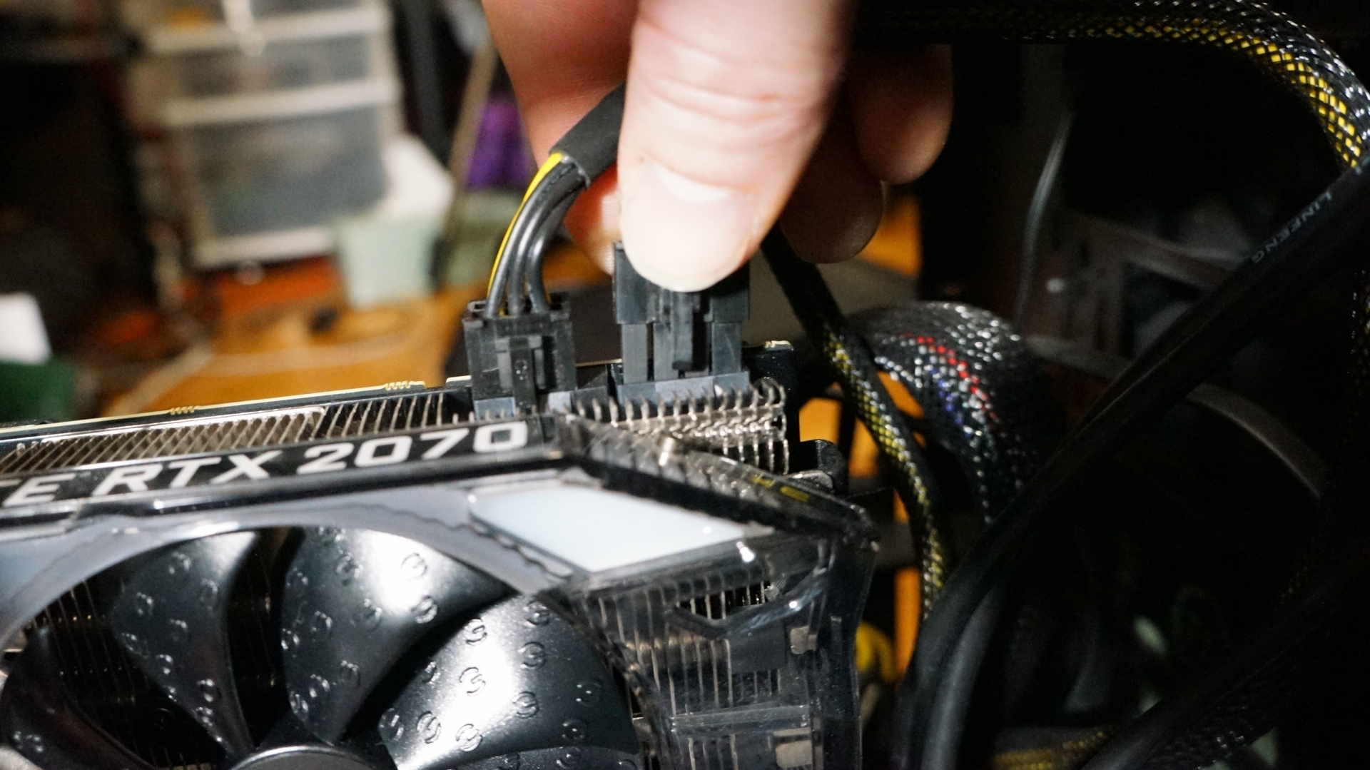 Installing a new graphics card into the PCIe slot of a gaming PC