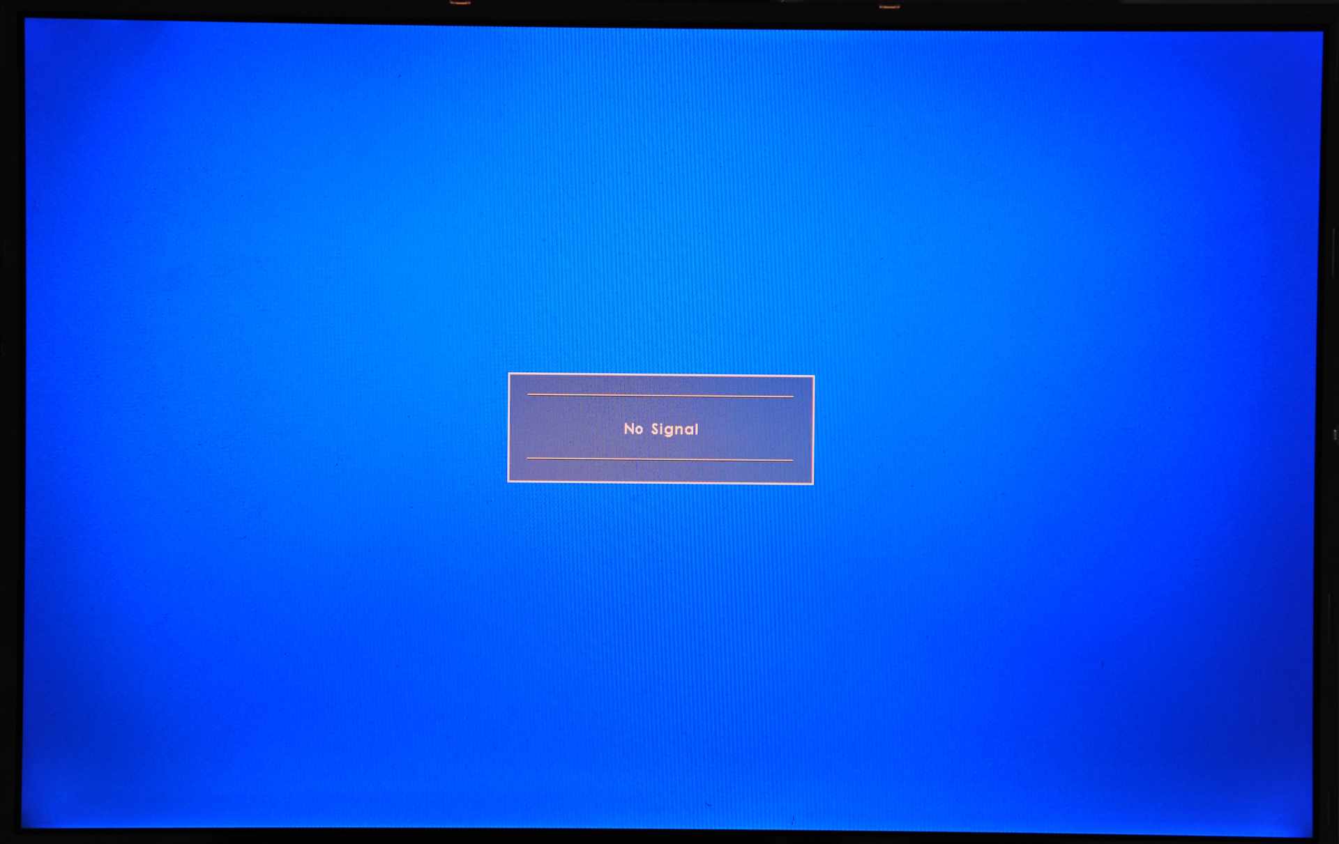 A television displaying a no signal message on an HDMI input with nothing detected