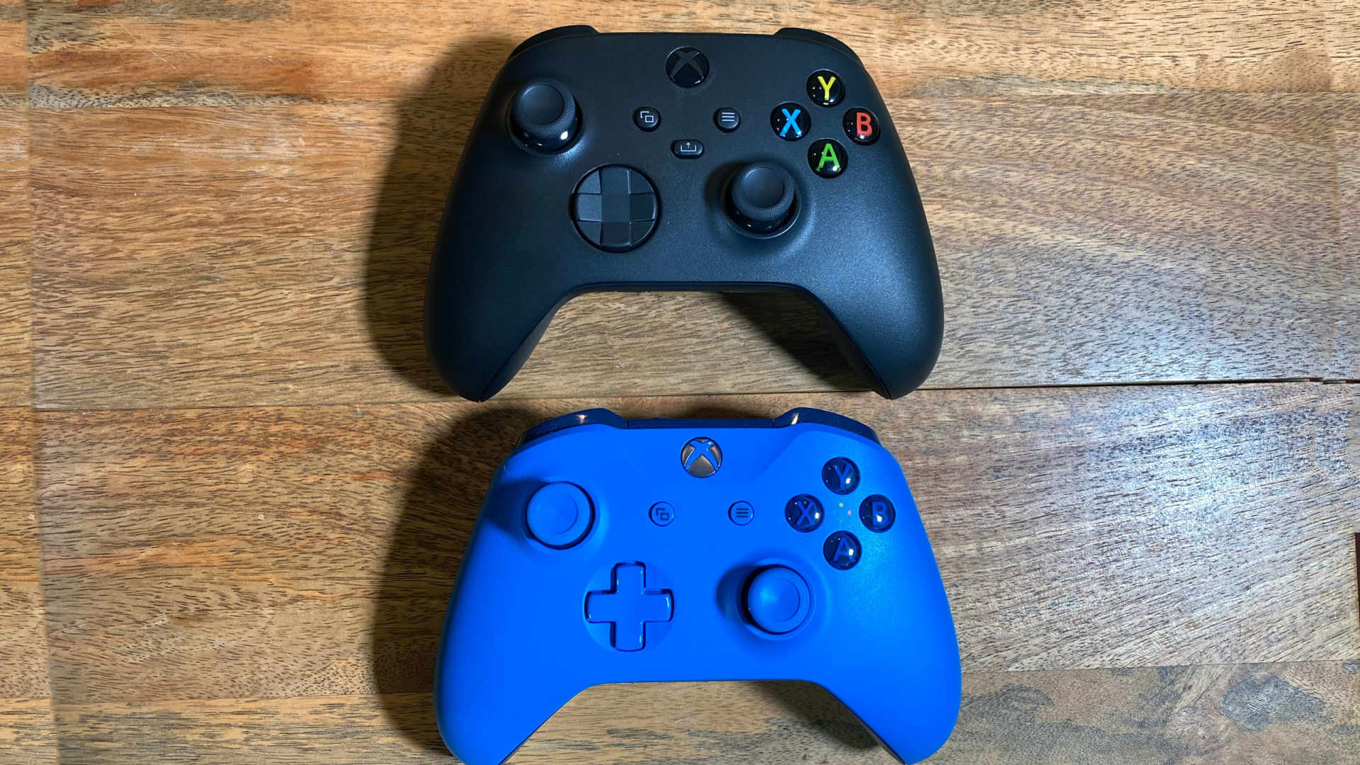 An Xbox Wireless Controller held in both hands during gameplay