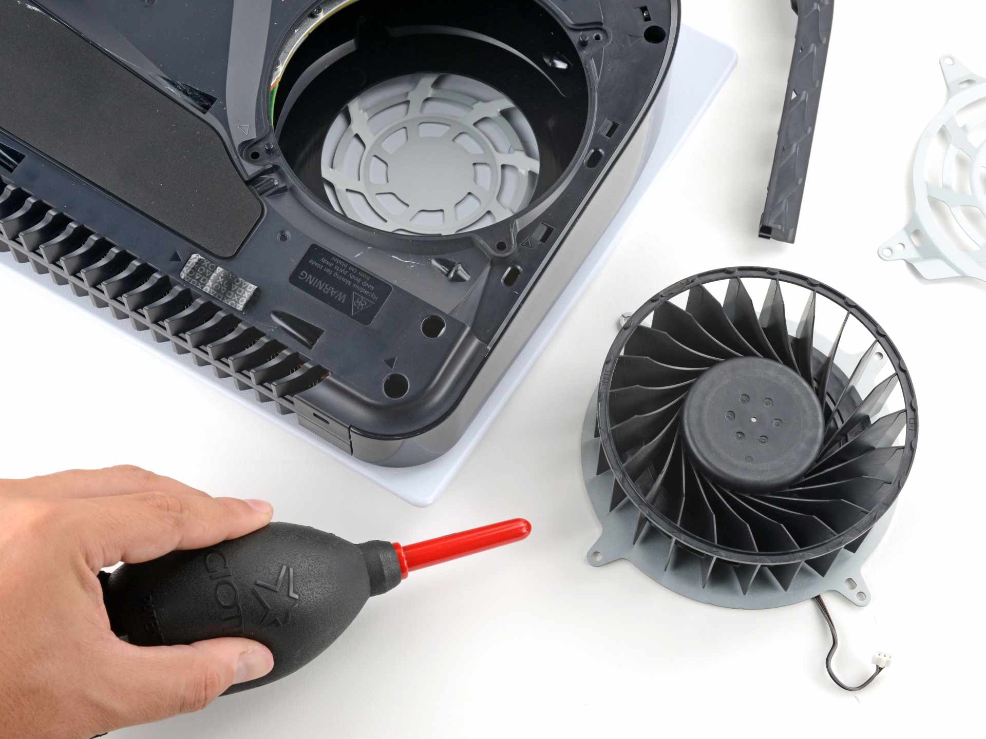 Dust built up inside a games console around the cooling vents and heatsink