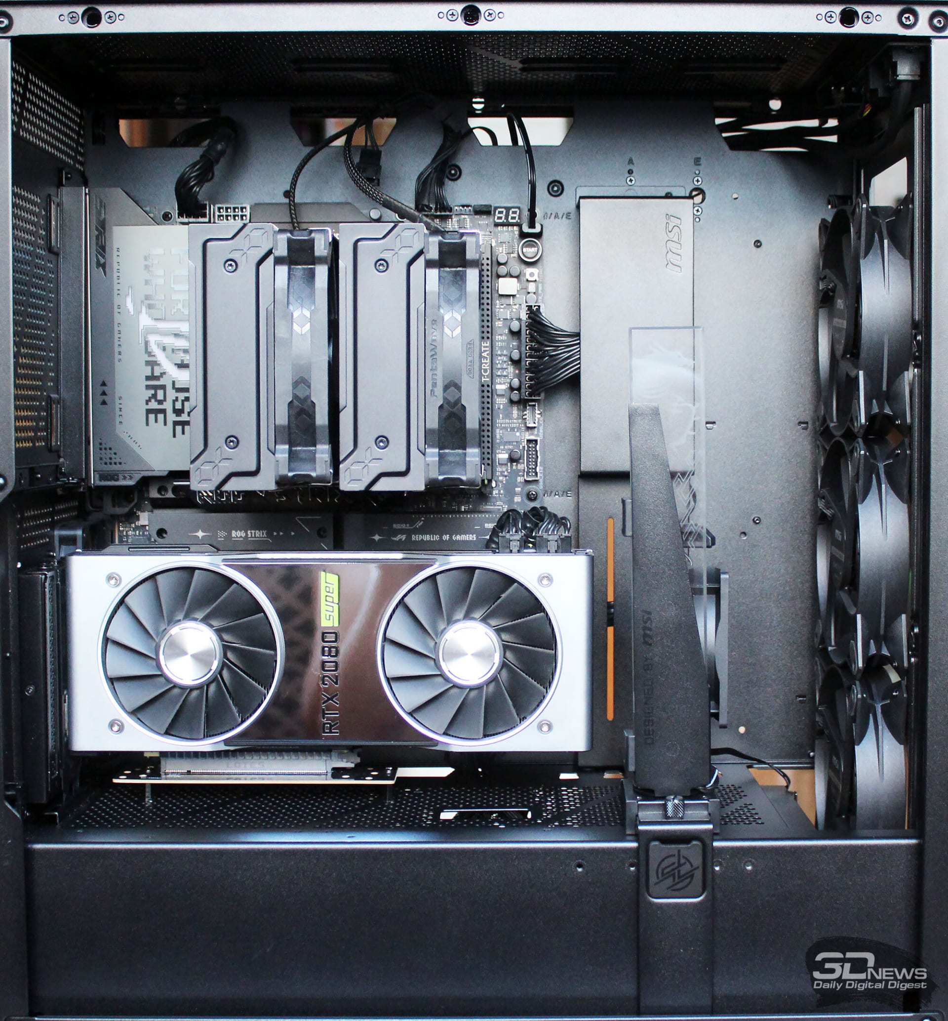 Interior of a mesh-front mid-tower PC case with the motherboard tray and cable routing channels visible