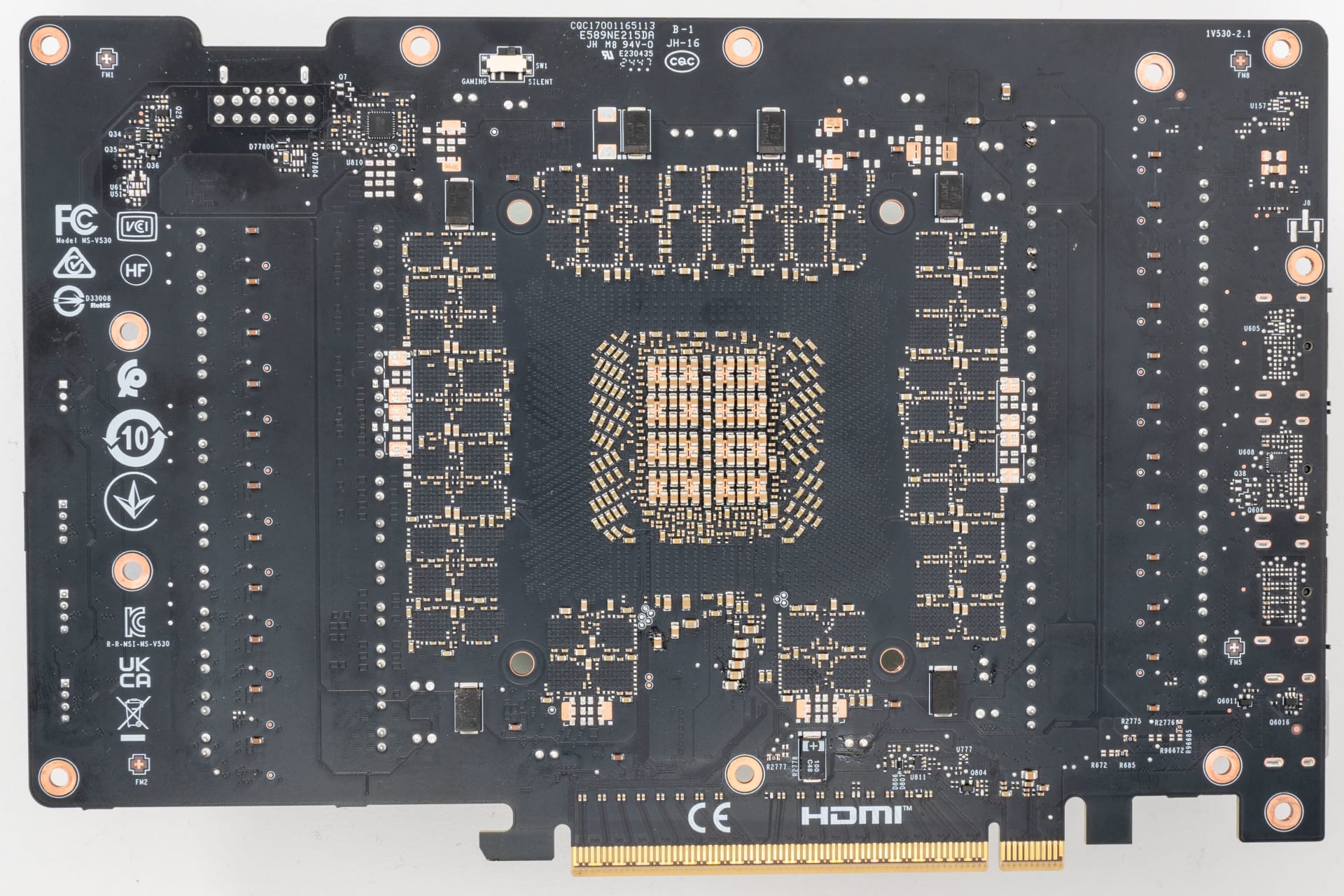 Bare graphics card circuit board with the cooler removed showing the full power delivery layout