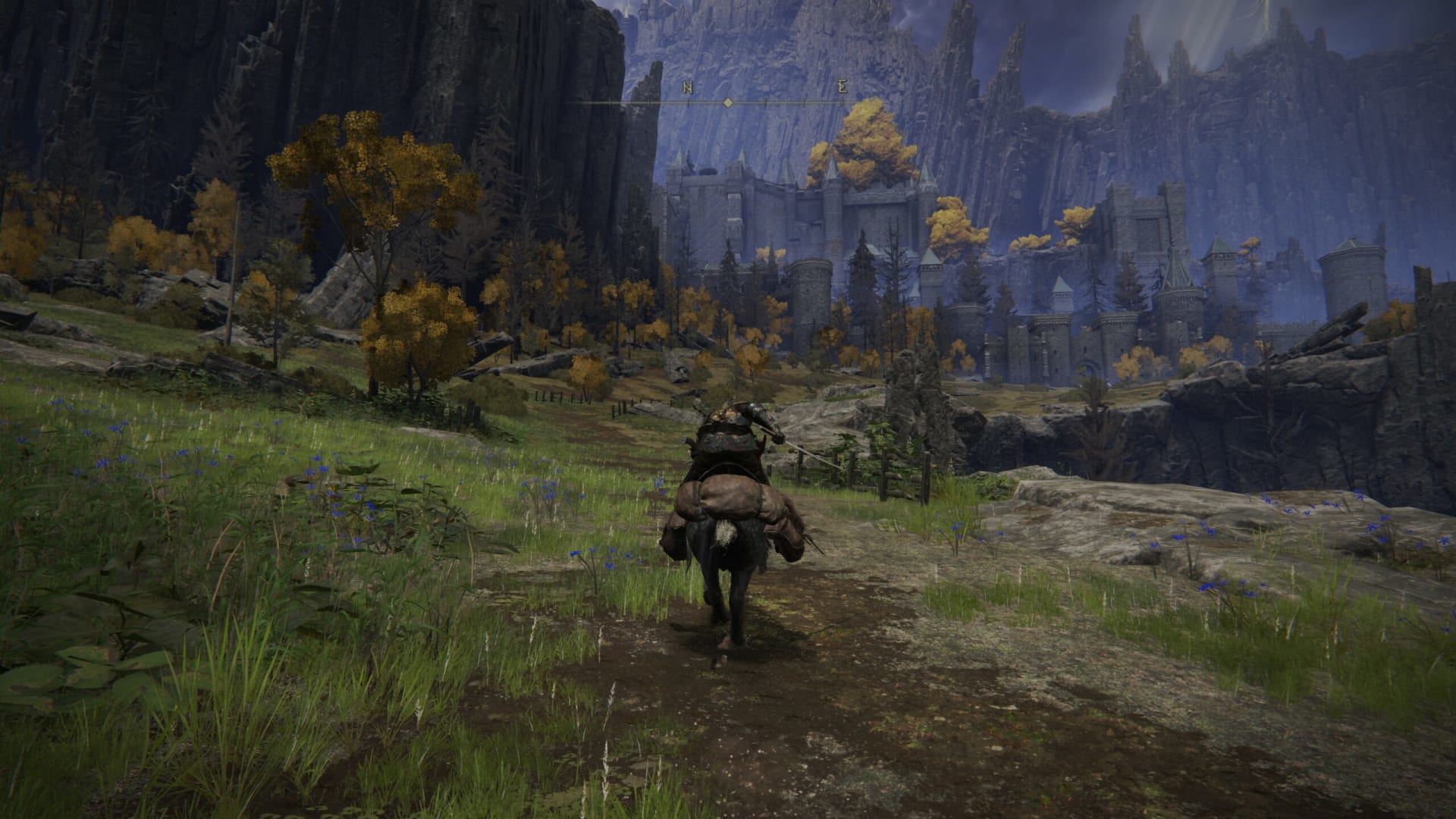 Riding Torrent through the open fields of Limgrave in Elden Ring