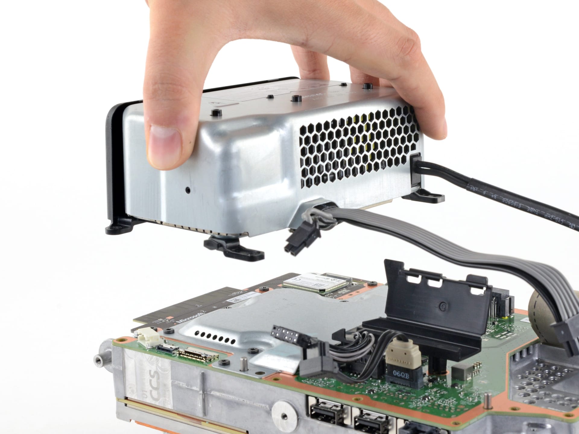 The internal power supply unit of an Xbox Series X exposed during a teardown