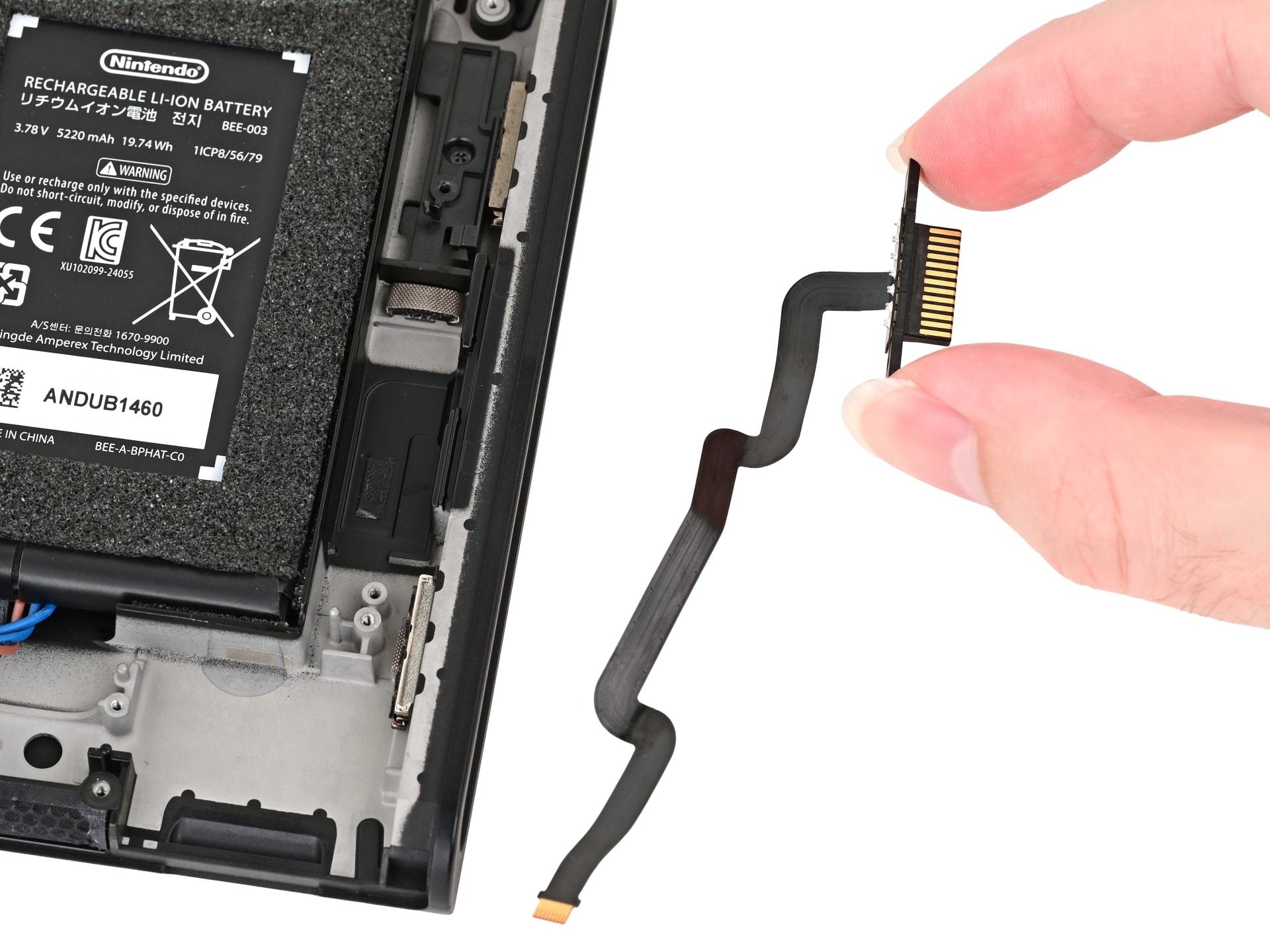 The analog stick module removed from a Joy-Con 2 showing the potentiometer housing