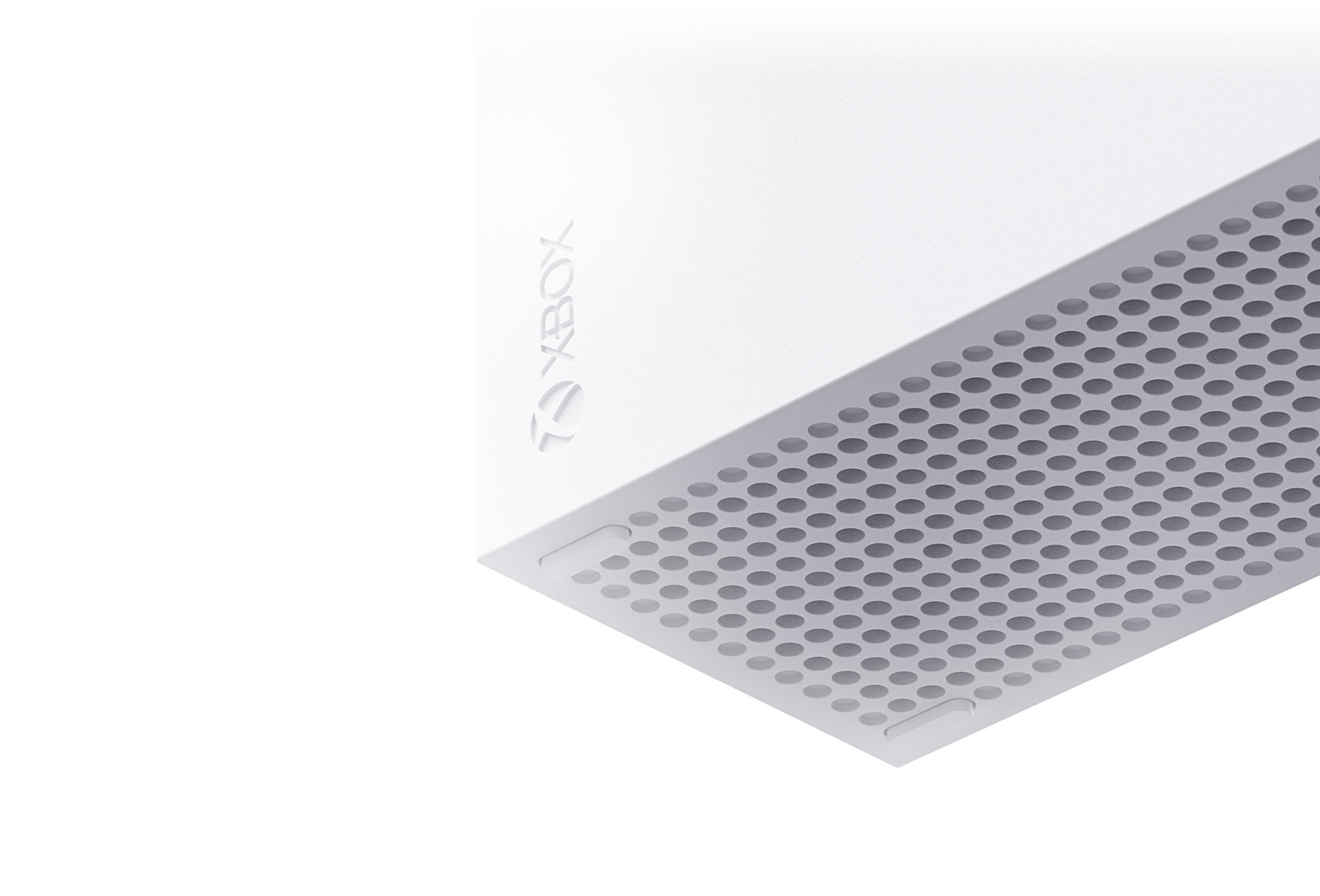 The top exhaust vent grille on an Xbox Series X that must stay unobstructed for airflow