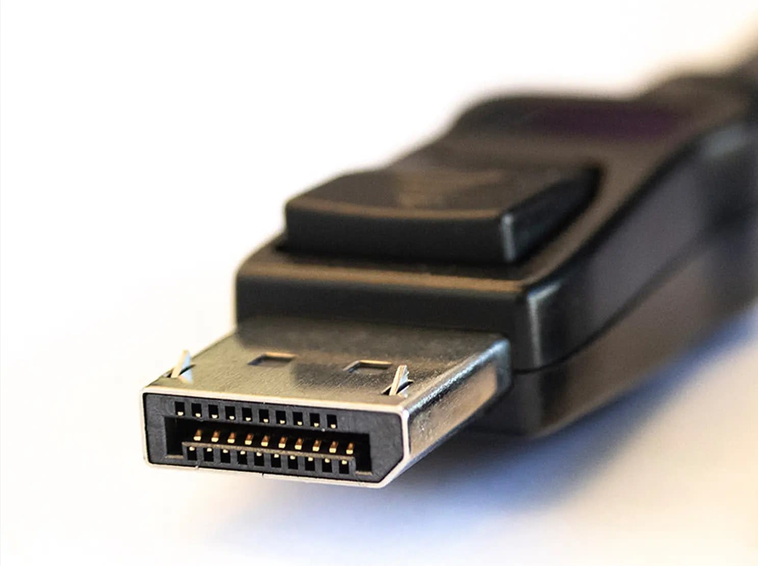 Close-up of a DisplayPort cable connector showing its pin contacts