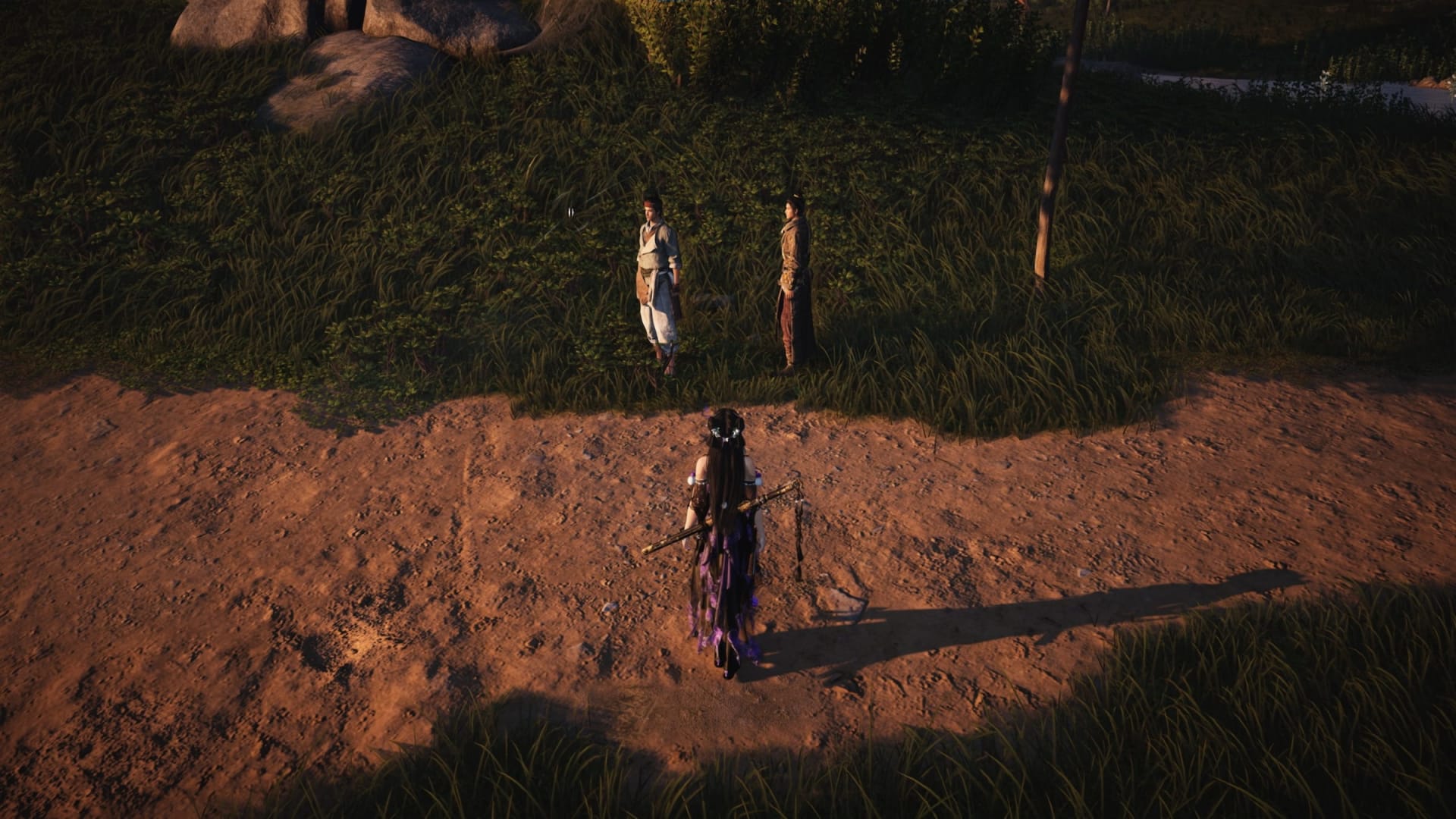 A Where Winds Meet player character on a dirt path approaching two villagers standing in tall grass