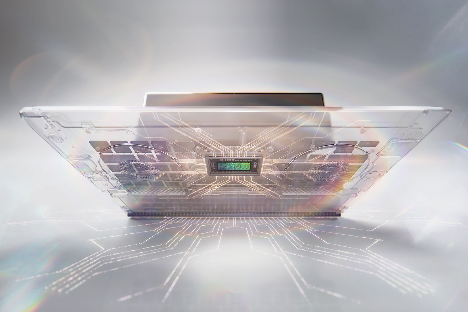 Nvidia render of a laptop with a transparent chassis revealing the RTX Spark superchip at its centre between two cooling fans