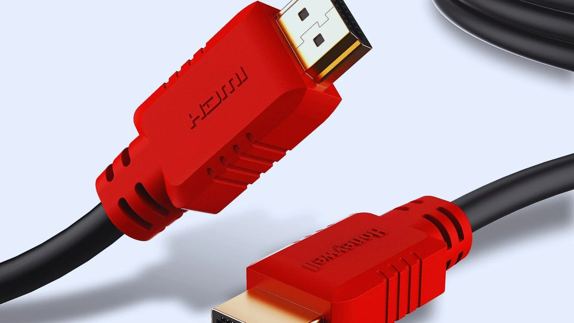 A red colored honeywall HDMI 2.1 cable for home theater system