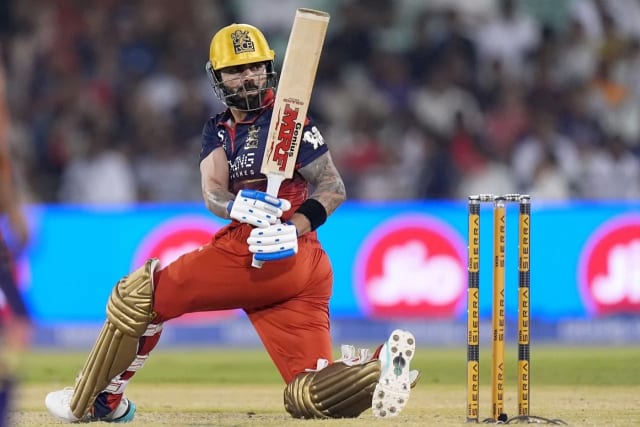 Kohli’s ninth IPL hundred powers RCB to the top