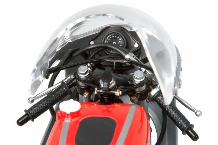 Close-up view of the handlebars and dashboard of an assembled Honda RC166 GP Racer 1/12 scale model