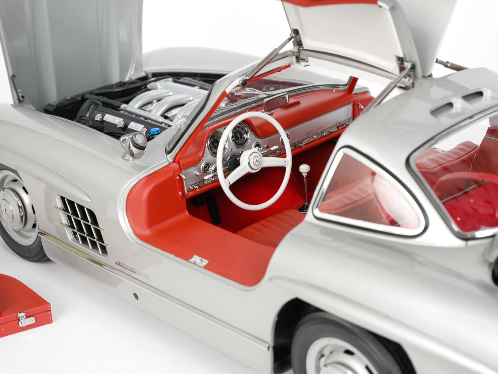 Close-up view of the engine and interior of an assembled Mercedes 300 SL 1/8 scale model
