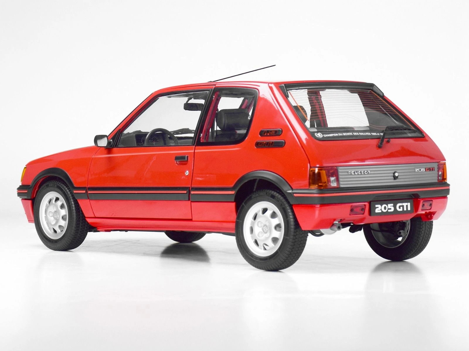 Rear-side view of an assembled Peugeot 205 1.9 GTI 1/8 scale model