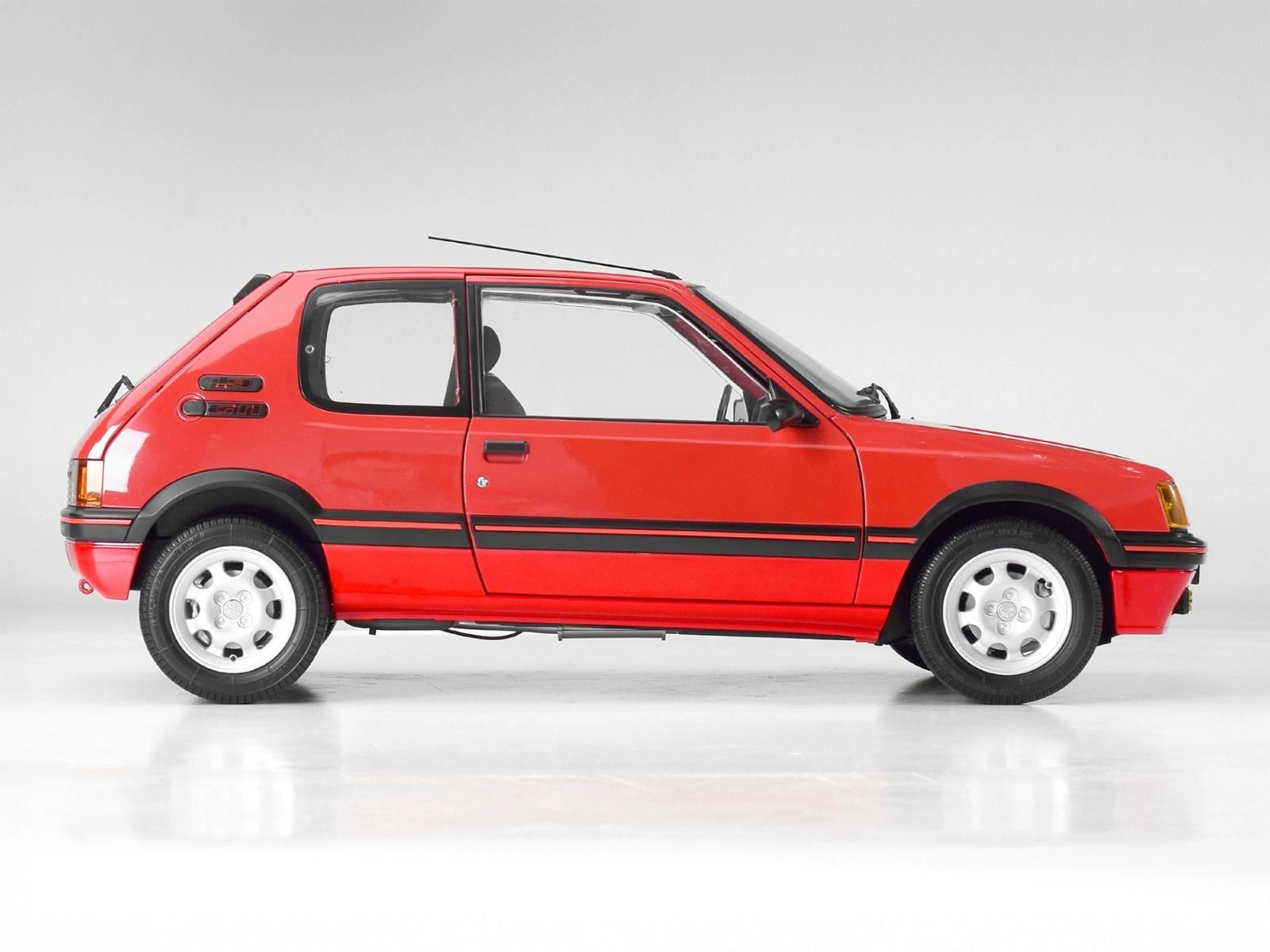 Side view of an assembled Peugeot 205 1.9 GTI 1/8 scale model