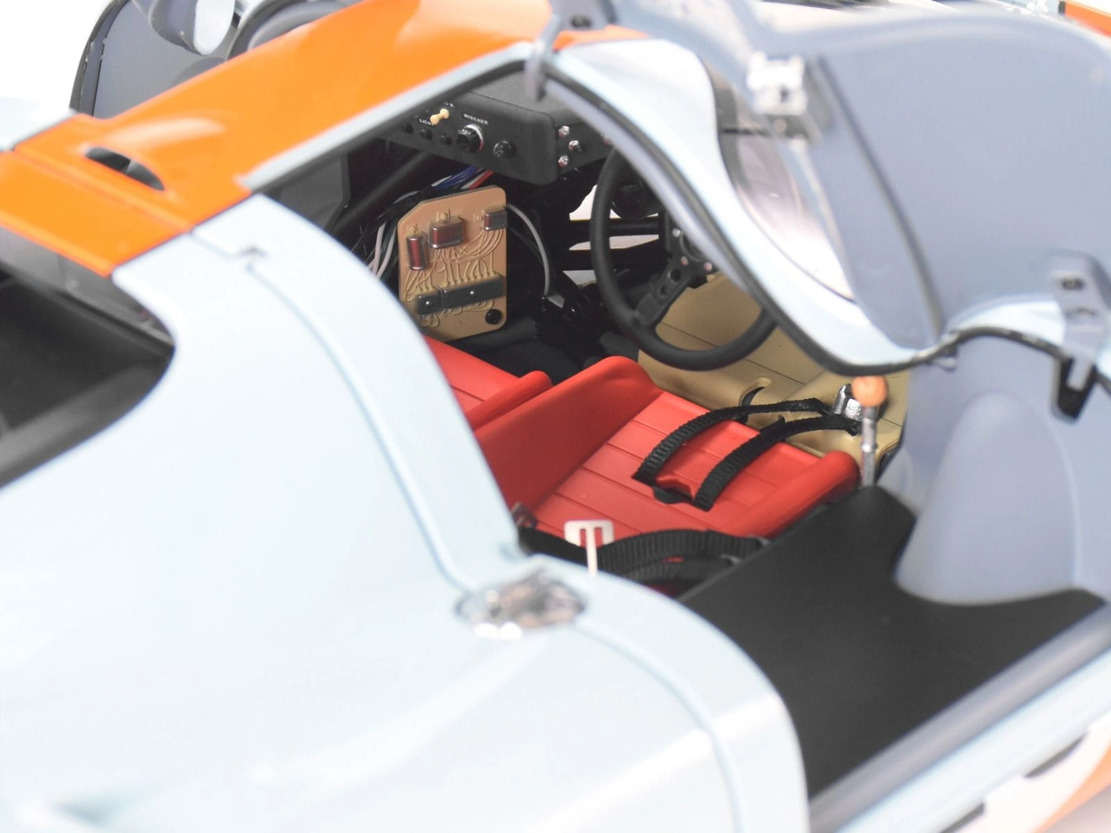 Close-up view of the interior of an assembled Porsche 917 KH Gulf Livery 1/8 scale model